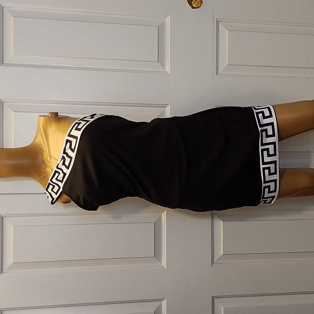 One shoulder off black and white dress